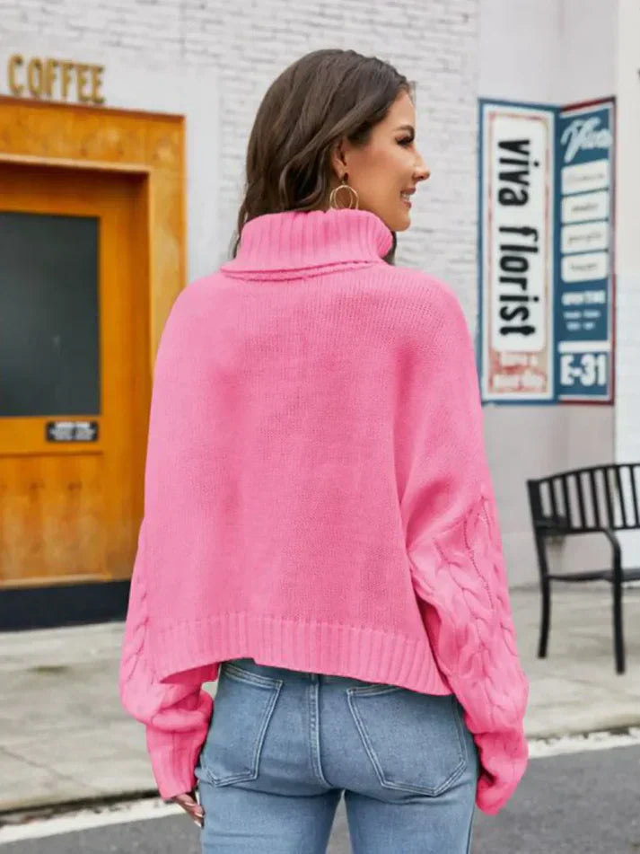 Damesweater med rullekrave lavet af tyk strik - vintermode 2024