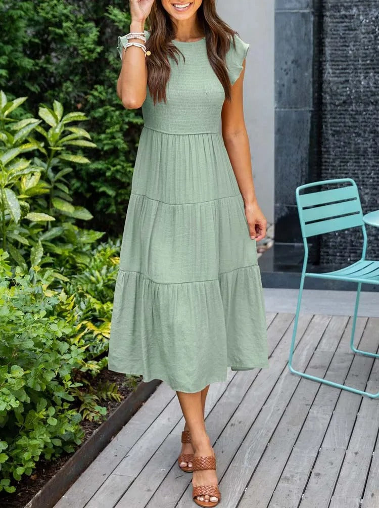 Elegant sommerkjole - flæsedetaljer, lommer