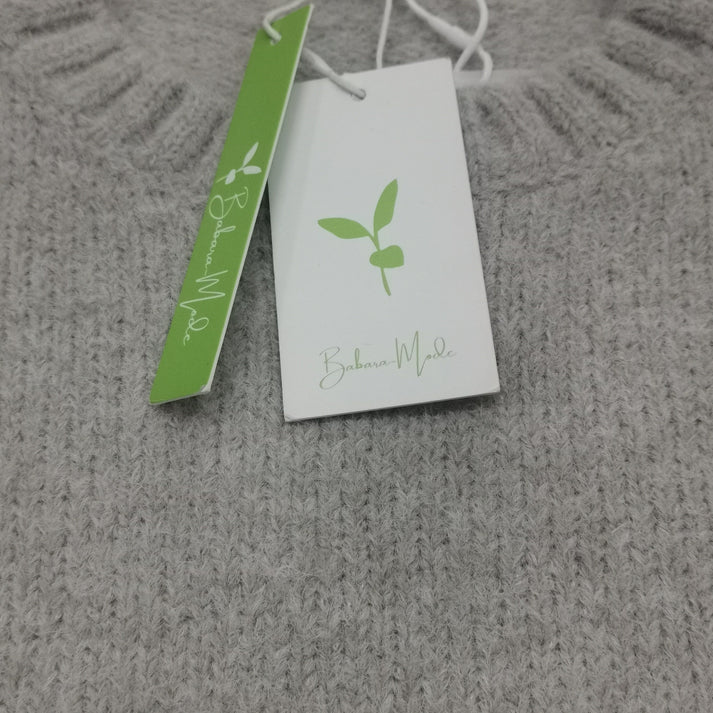 Oversized sweater med elfenbensfarvet frontlomme og store dybe lommer til kvinder