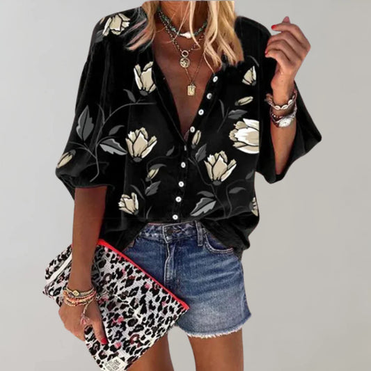 Afslappet damebluse med blomstermønster og knapper