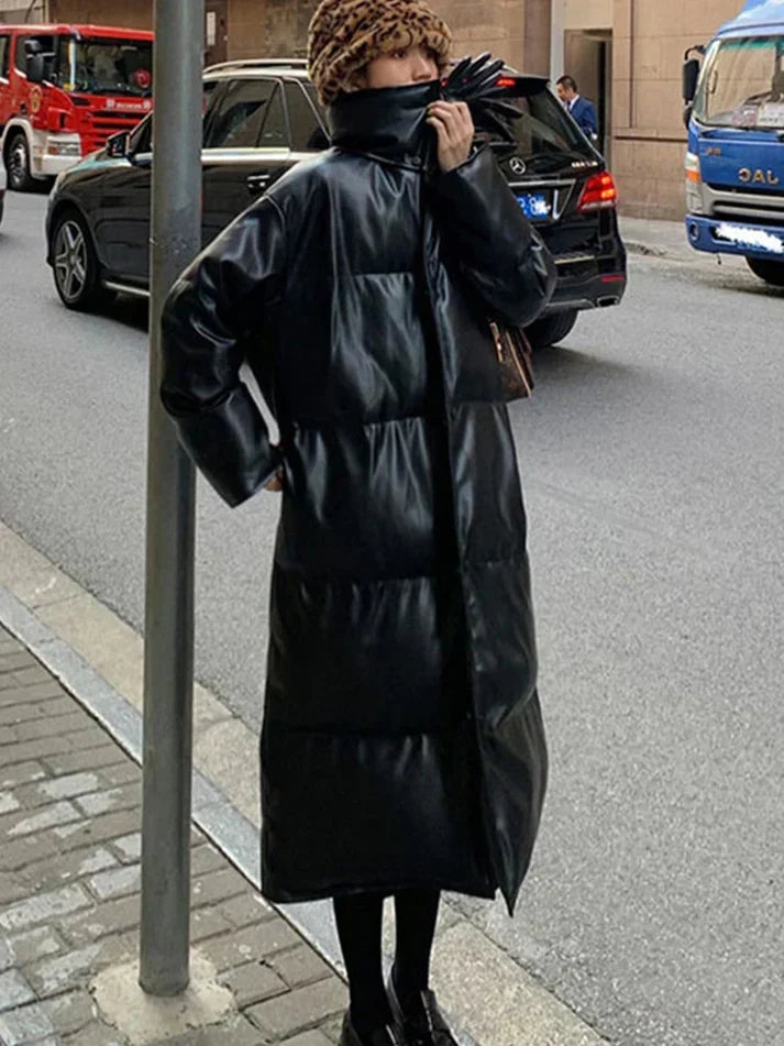 Aimee - lang pufferjakke i læder med bælte