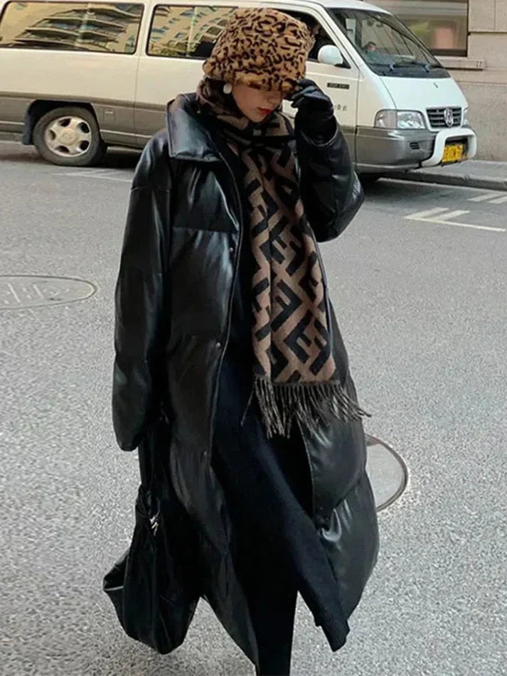 Aimee - lang pufferjakke i læder med bælte