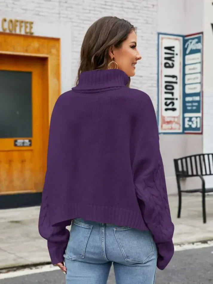Damesweater med rullekrave lavet af tyk strik - vintermode 2024