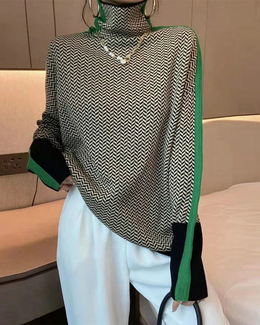 Elegant rullekravetrøje i farveblokdesign