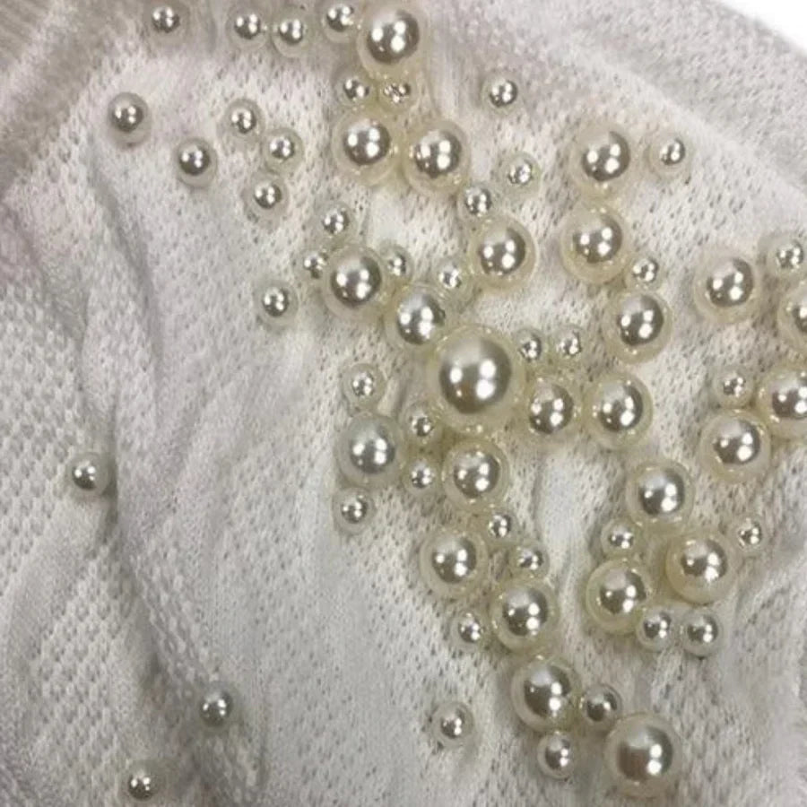Gwyneth - elegant strikket trøje med perler til kvinder